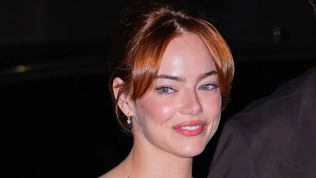 Emma Stone is supported by her husband as they make a rare appearance