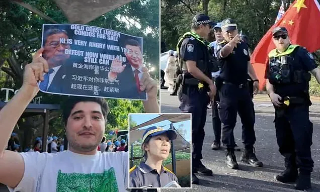 Wild moment Aussie protester is blocked from protesting China
