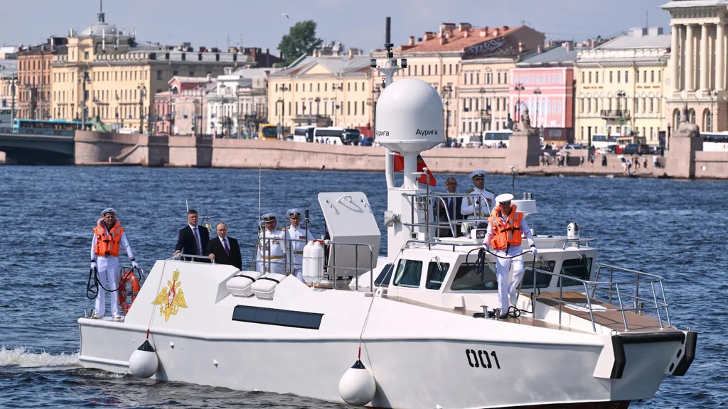 Russia scales down celebrations honoring its navy as Ukraine launches more drone attacks