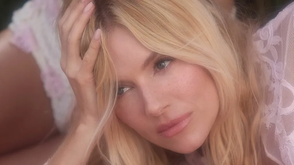 Sienna Miller stuns in pink lingerie while concealing her baby bump