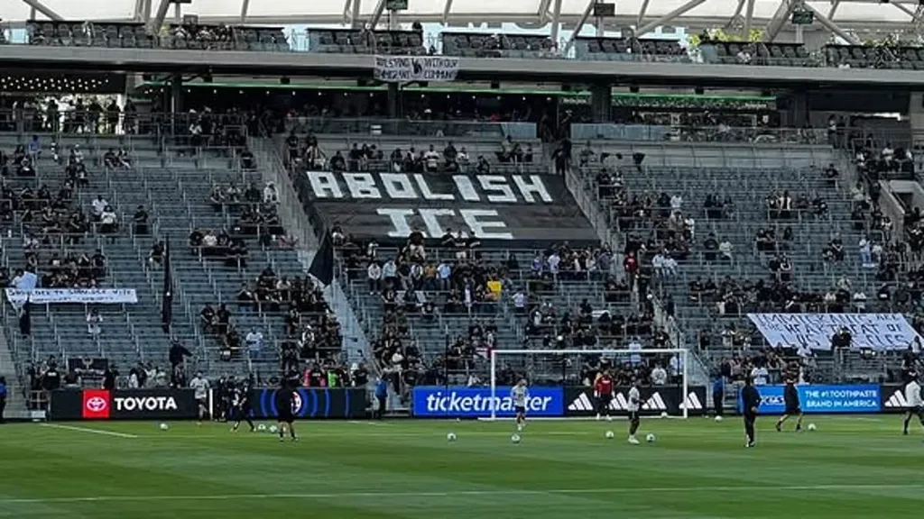 LAFC fans unfurl anti-ICE banners as Trump protestors clash with cops