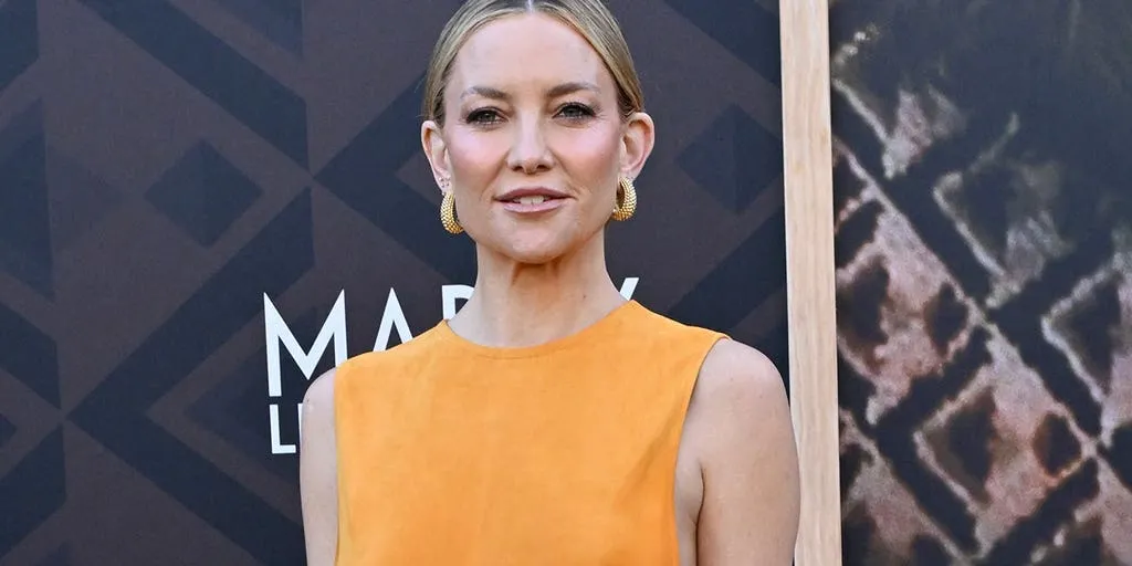 Kate Hudson turns heads in bold yellow dress with revealing cutouts while on the red carpet