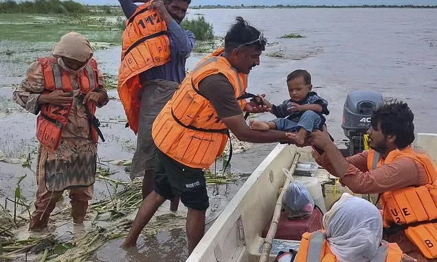 Mass evacuations in eastern Pakistan as India releases water from...