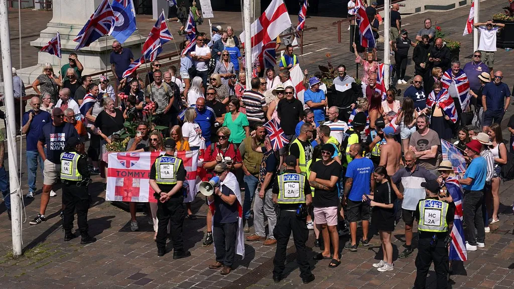 Anti-migrant protesters face counter-demonstrators in Portsmouth