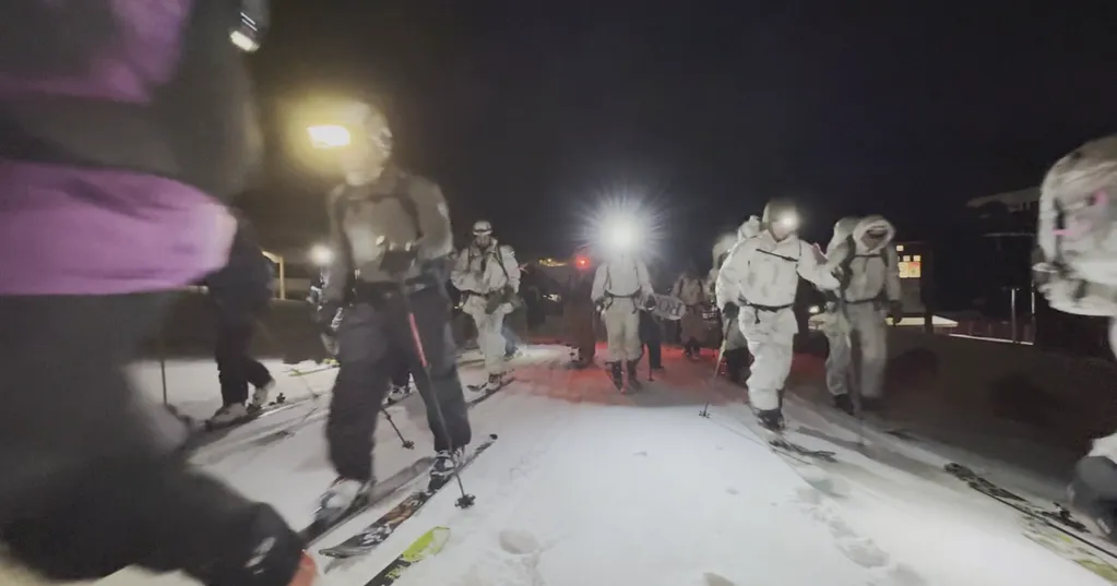 50+ commemorate Colorado unit's critical WWII mission with nighttime trek