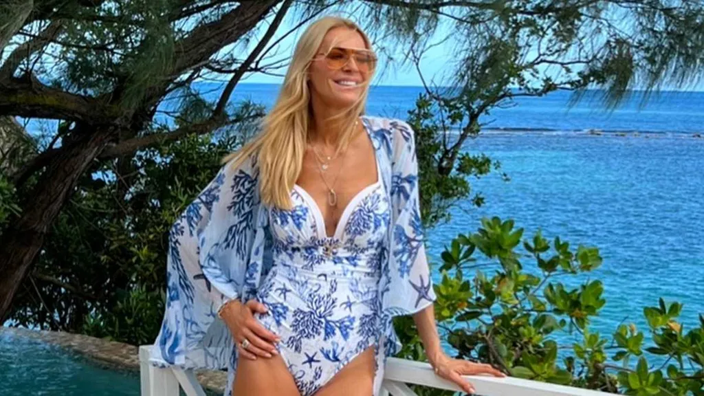 Tess Daly, 57, shows off her age-defying looks in a plunging swimsuit