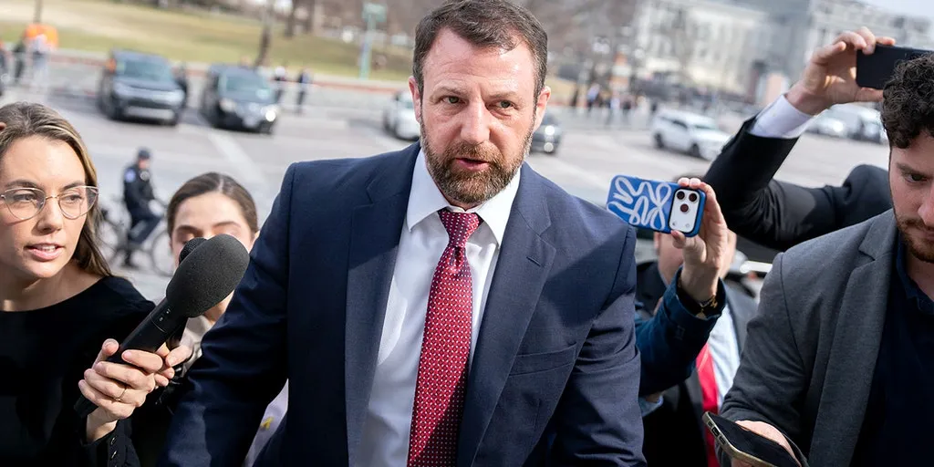 Mullin wins backing from China, Cuba hawks  --  and some Democrats  --  as critics question fitness to lead DHS