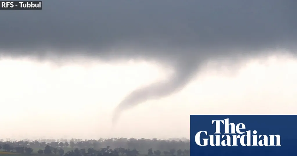Tornado in central NSW and flood rescues in Sydney as wild weather soaks state