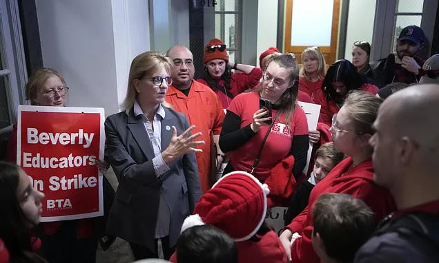 Striking Massachusetts teachers appeal to governor on Statehouse steps