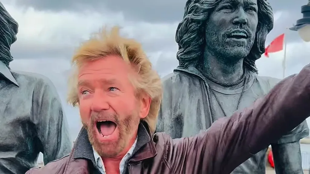 Noel Edmonds spotted once again wearing ODD shoes ahead of TV return