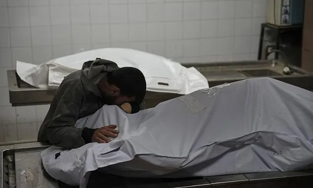 A grandmother and her grandson burn to death in a Gaza tent as...