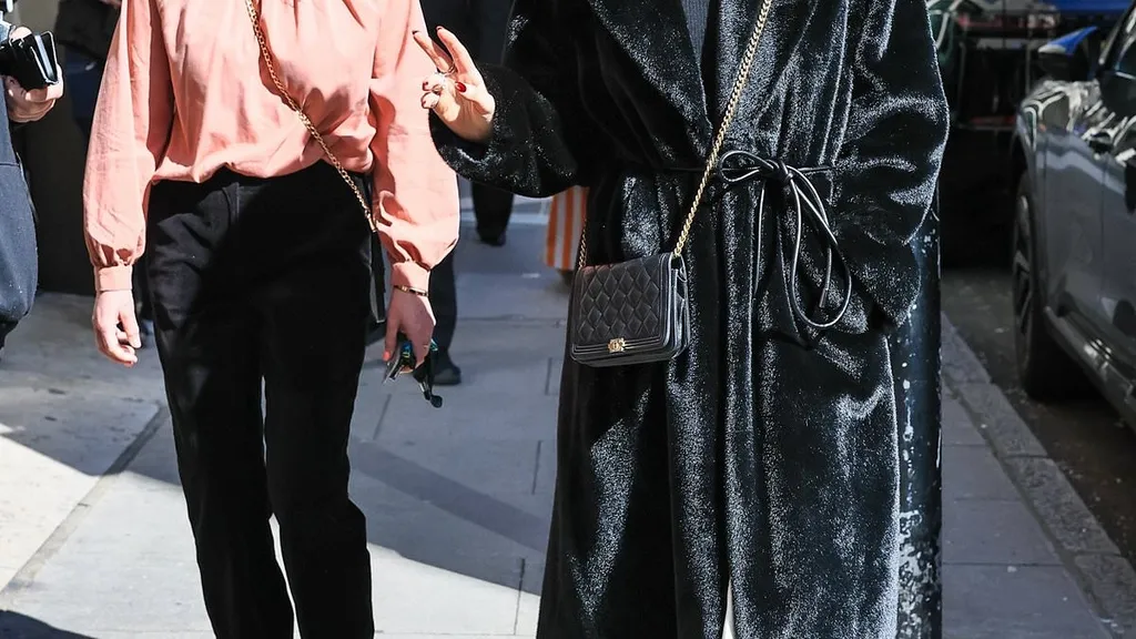 Delta Goodrem enjoy a rare outing with husband Matthew Copley