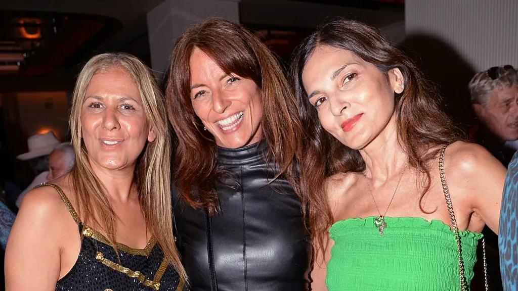 Davina McCall, 57, stuns in a sexy black leather mini dress