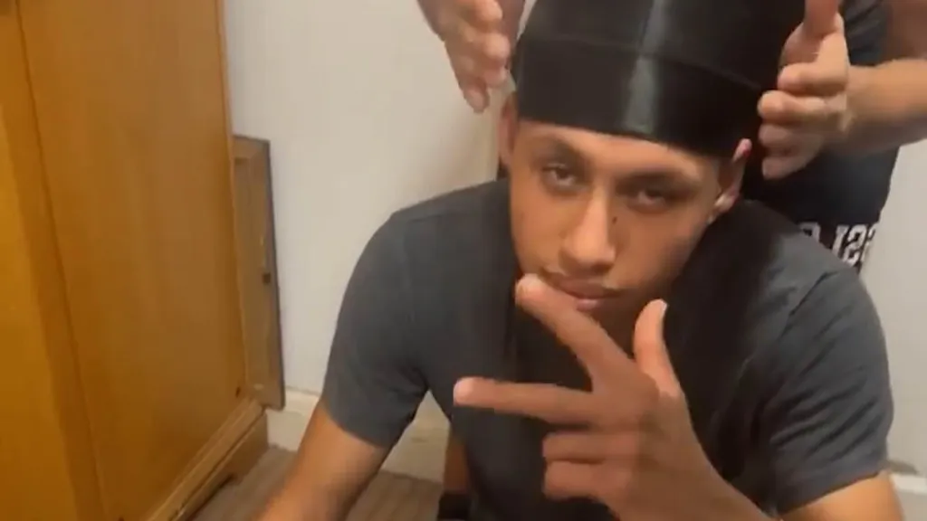 Moment hotel migrants party at hotel barbecue after alleged rape