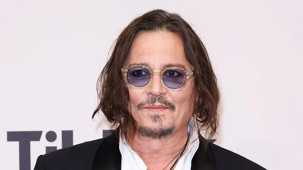Johnny Depp calls himself a 'sucker' in rare comment on Amber Heard