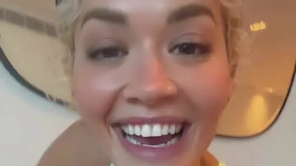 Rita Ora stuns in a gym bra as she announces a new song release