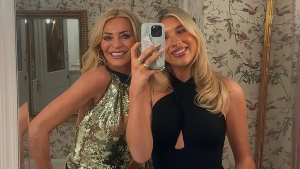 Tess Daly poses with her lookalike daughter for Christmas night out