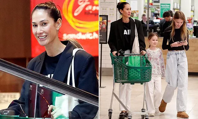 Lindy Klim seen shopping at budget stores Big W and Priceline Pharmacy