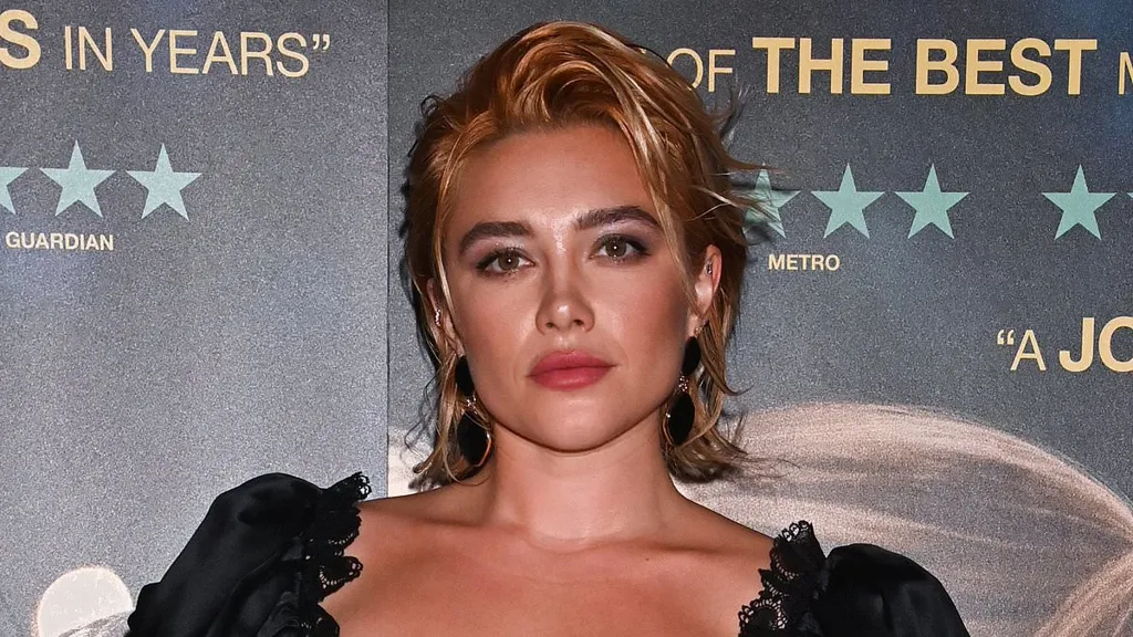 Florence Pugh goes braless under a silky black dress