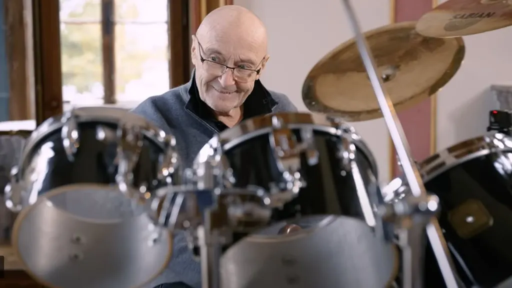 Frail Phil Collins, 73, makes an emotional return to his drum kit