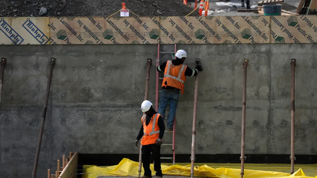 US economy added 911,000 fewer jobs than previously reported