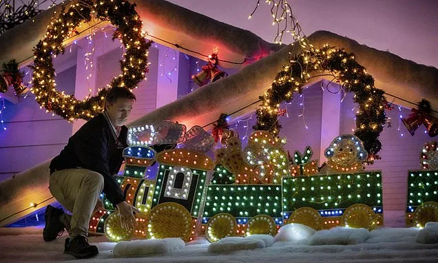 Elaborate holiday light displays are making spirits bright in a big...