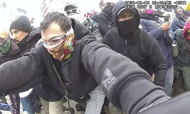 Judge reduces prison sentence for Capitol rioter who berated and...