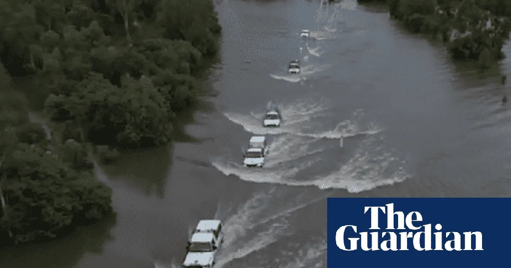 NT cop Ben Parfitt rescued two dozen school kids from a flooded caravan park. Then he made headlines for saving a dog