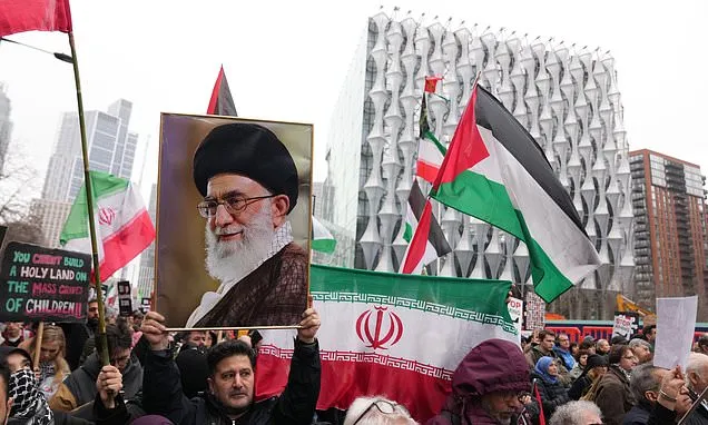 Thousands protest at US embassy in London calling for end to...