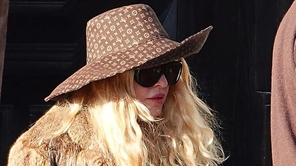 Madonna, 67, sips on an espresso while  in Venice