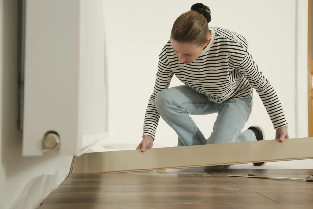 Couple take up flooring in laundry room, what was underneath stuns them