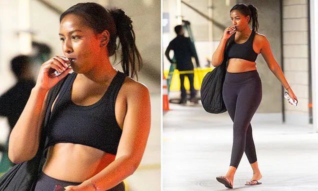 Sasha Obama puffs on a vape as she steps out of luxury gym