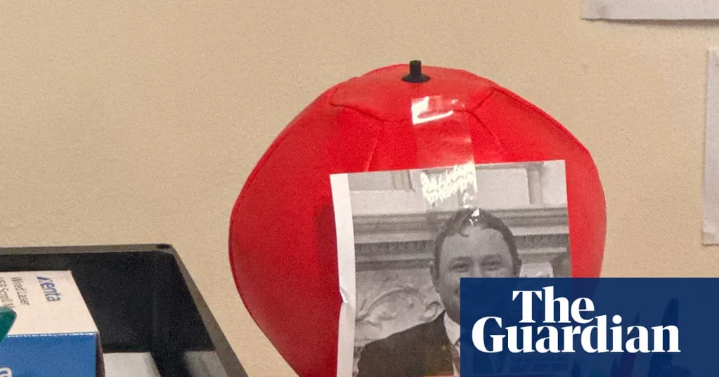 Local reporter 'shocked' over picture of his face on punchbag at UK town hall