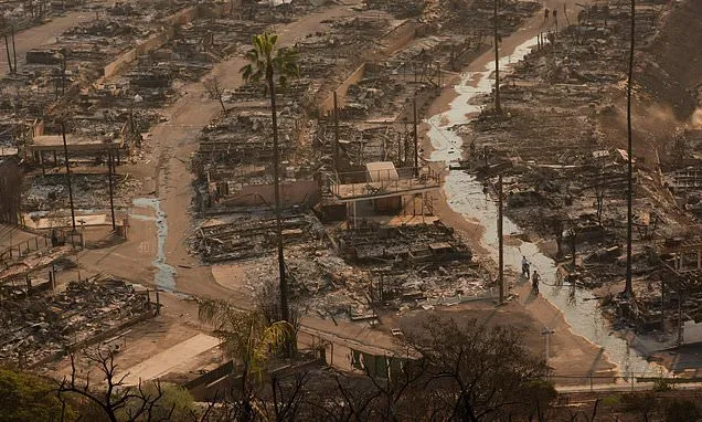 LA area's 2 biggest blazes burn at least 10,000 structures, while...