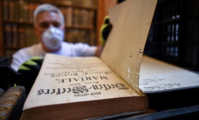 Hungary's oldest library is fighting to save 100,000 books from a...