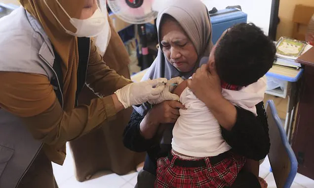Indonesia launches a measles vaccination campaign after 17 die in...