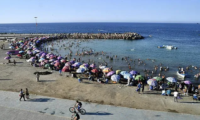 Bermuda shorts, beachwear and a local ban divide Algerian town