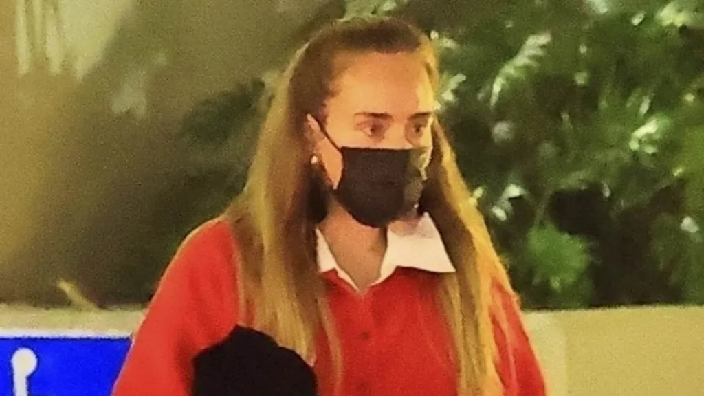 Adele steps out for Christmas party with fiance Rich Paul and his kids