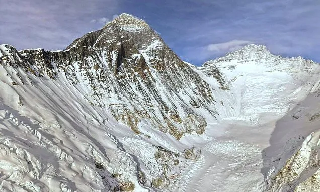 Photos show climbers attempting to scale Mount Everest despite...