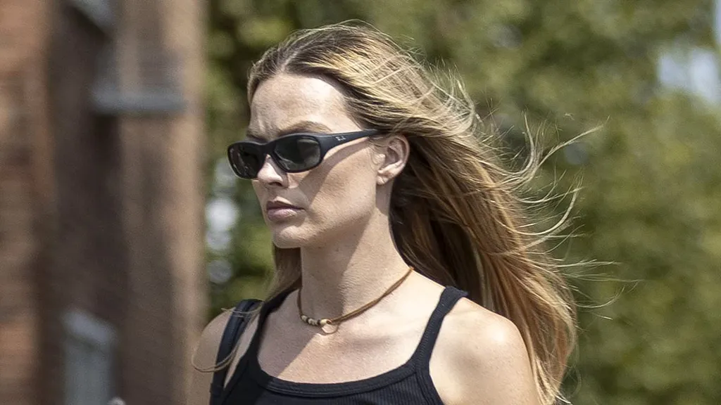Margot Robbie steps out wearing sunglasses after  Ibiza and Glasto