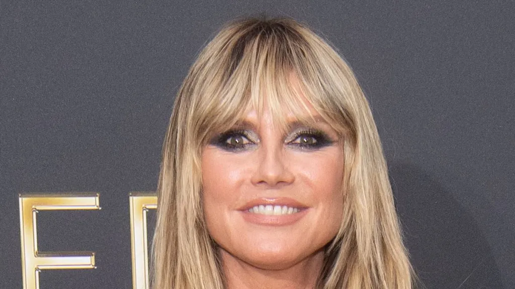 Heidi Klum puts on very busty display at star-studded Berlin event