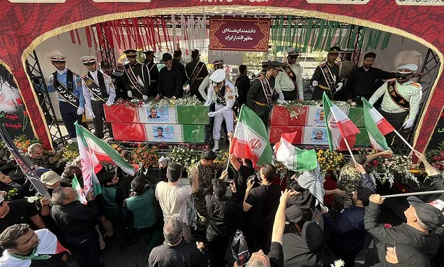 Thousands mourn top Iranian military commanders and scientists...