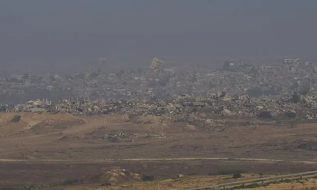 At least 21 Palestinians killed while heading to Gaza aid hub,...