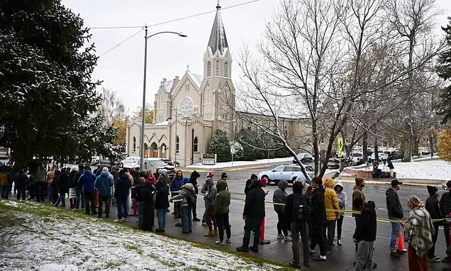 Free pizza and a DJ help defrost Montana voters lined up until 4...