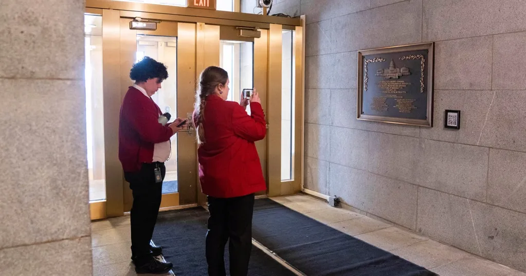 Jan. 6 plaque honoring police officers displayed at the Capitol after a 3-year delay: 