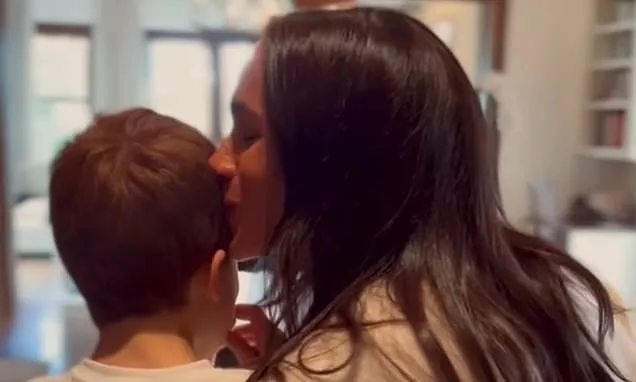 Meghan reveals she's reading motherhood book as author reacts