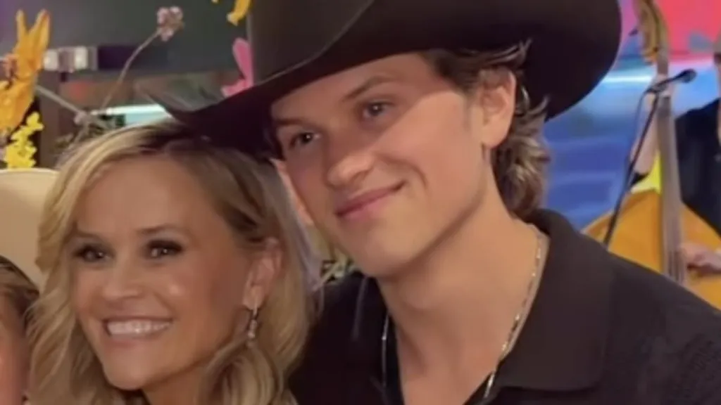 Reese Witherspoon poses with all three of her kids