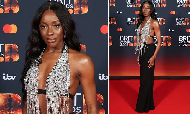 AJ Odudu showcases her incredible figure on the BRIT Awards red carpet