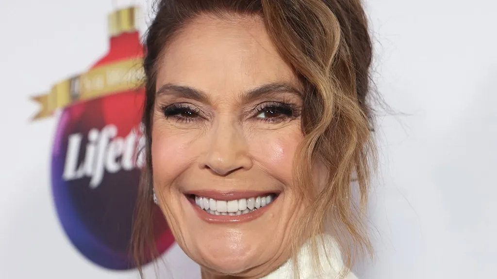 Teri Hatcher, 59, shows off her age defying looks in glam white dress
