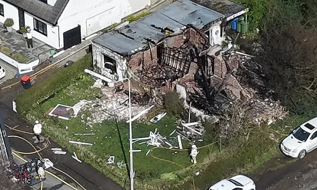 Man arrested after 'arson' explosion wipes out home in village